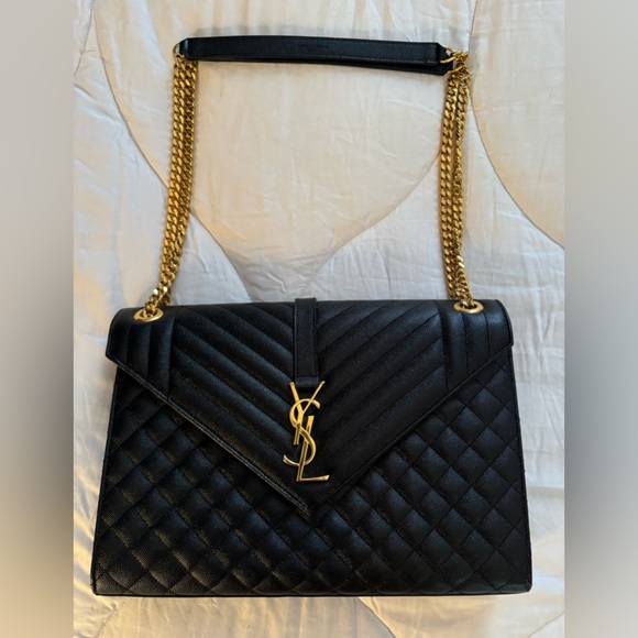 YSL shoulder bag in chevron/ diamond-quilted black leather. Gold Hardware - Picture 1 of 14